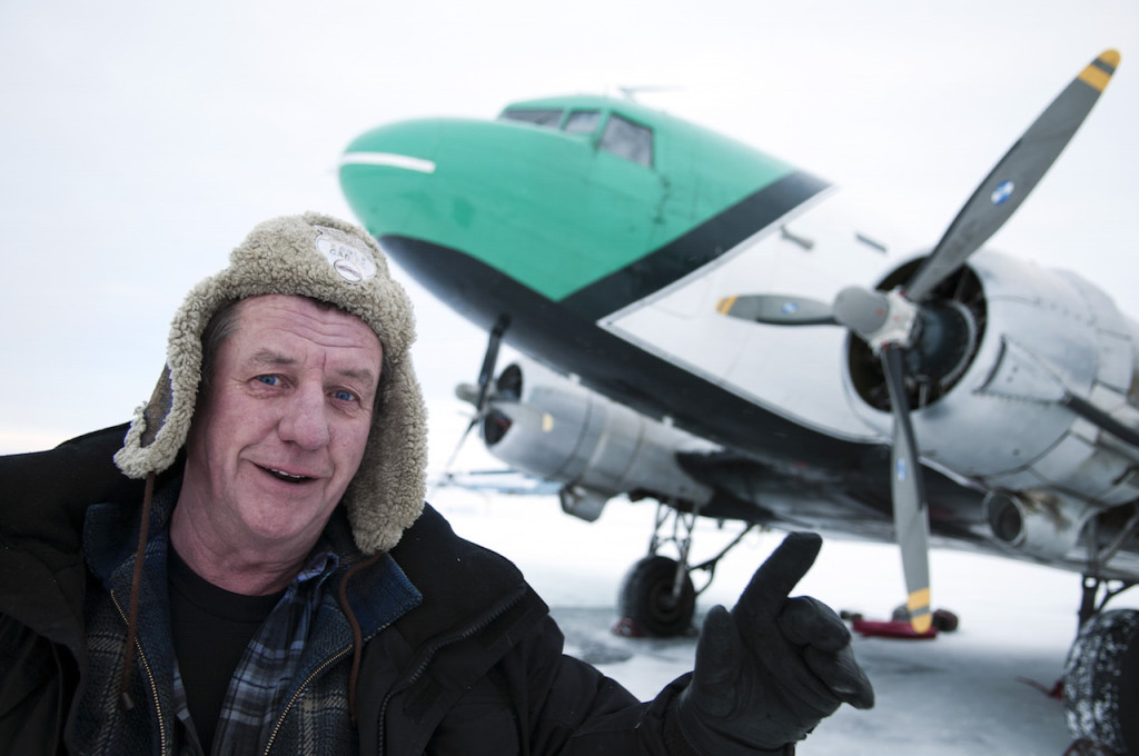 Yellowknife, Northwest Territories, Canada, February 2012. Bush Pilot 'Buffalo' Joe McBryan one of the original ice pilots on the North started flying planes at age 15. The Douglas DC-3, otherwise known as a C-47, Dakota, or Gooney Bird, made its first flight on December 17, 1935, over sixty years ago. Since that day, DC-3‚??s have been flying all over the world, hauling freight and passengers to every corner of the globe. This aircraft went into production at a time of war, the second World War. The 1940's 1950's vintage transport aircraft of Buffalo Airways service the remote airstrips in the Arctic outposts and villages of Northern Canada. They have been immortalized by Ice Pilots NWT, the popular reality TV series. Photo by Frits Meyst/Adventure4ever.com